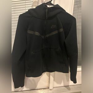 Never worn Nike jacket with hood. Size xs